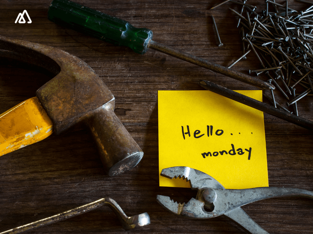 yellow post-it with 'hello monday' note