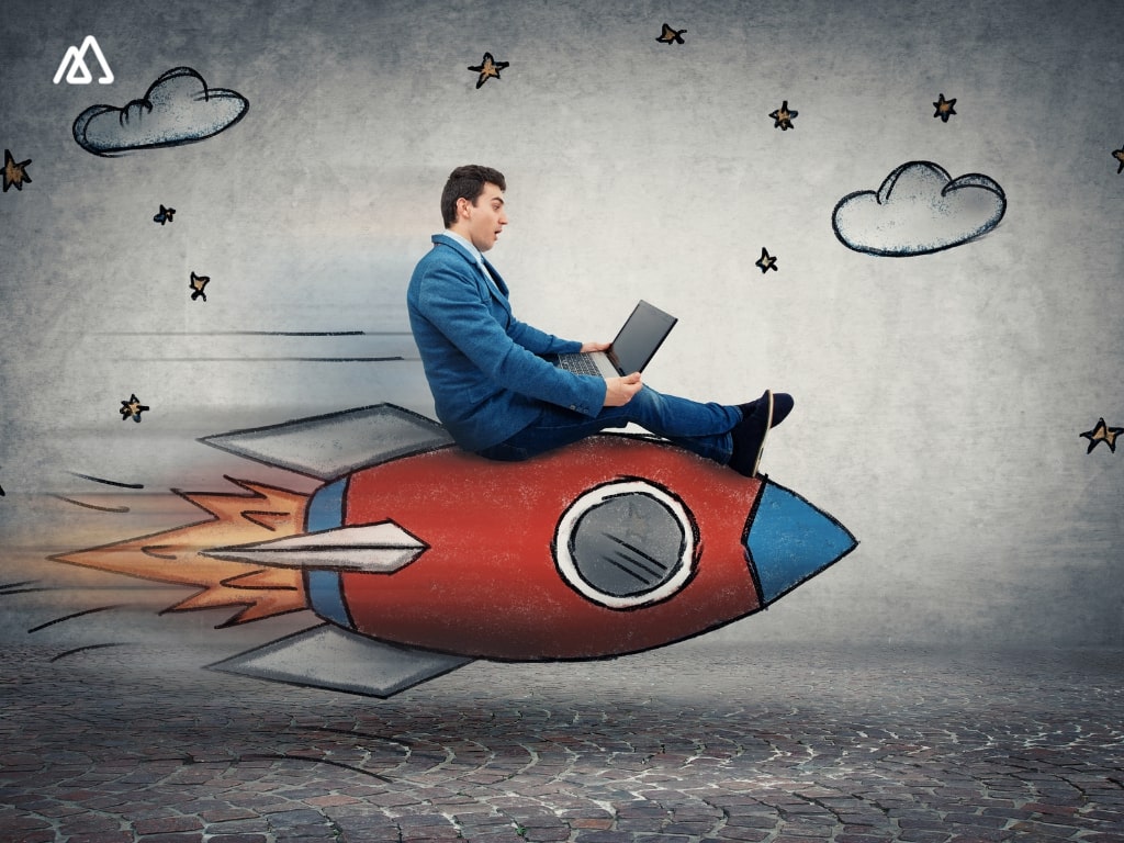 sales person with laptop, on a rocket ship