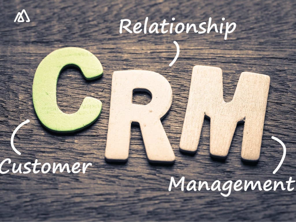 CRM written on a grey background